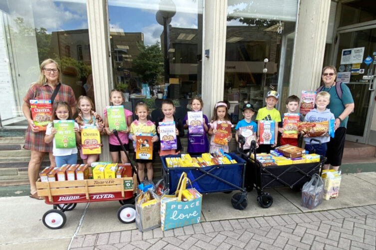 Cheerio drive collects almost 600 boxes for New Love Center